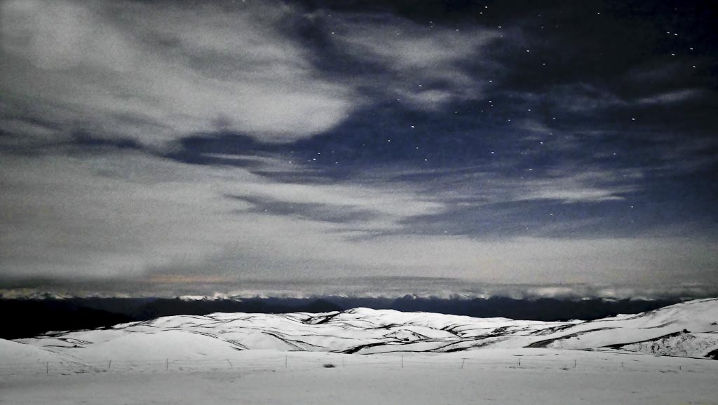 Night full moon ski tour at The Snow Farm cross country skiing area, Cardrona Valley, New Zealand