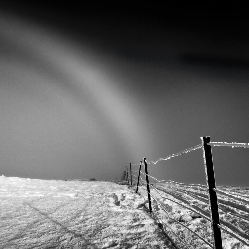 Ice bow and fence at the Snow Farm, Cardrona, New Zealand