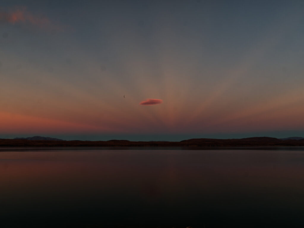 Crepuscular rays - Lake Pukaki in the foreground
